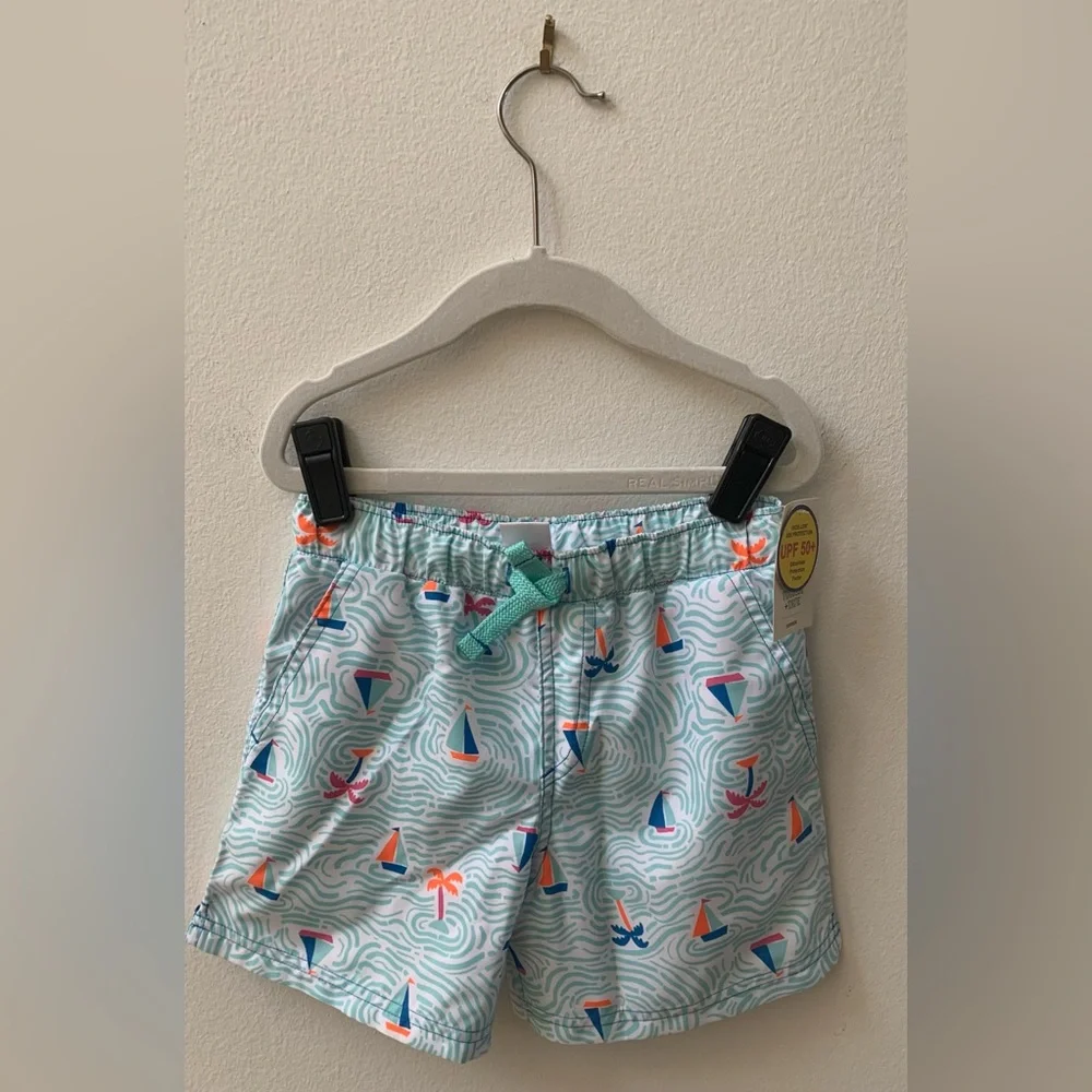 Tucker Tate Swim Trunks
(2) Pair
Sailboat Print
Turtle Print - Picture 3 of 9